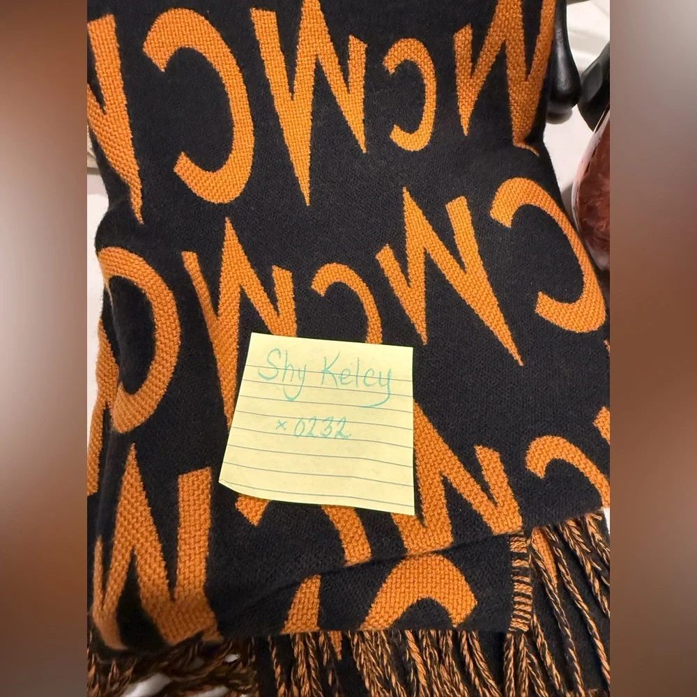 MCM DOUBLE SIDED STOLE/SHAWL
SIZE:  one size 
COLOR:  Cognac / Black - Picture 4 of 5